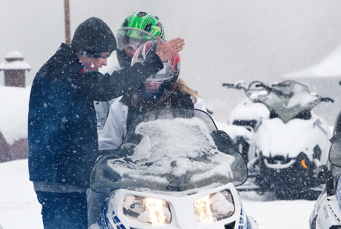 (Scott Sommerdorf   |  The Salt Lake Tribune)   
Renters get a last minute prep on the trails as they were ready to head out on their rented snowmobiles at Daniel Summit Saturday, December 23, 2017. While the number of snowmobile licenses in Utah is declining, trail usage is up dramatically.  