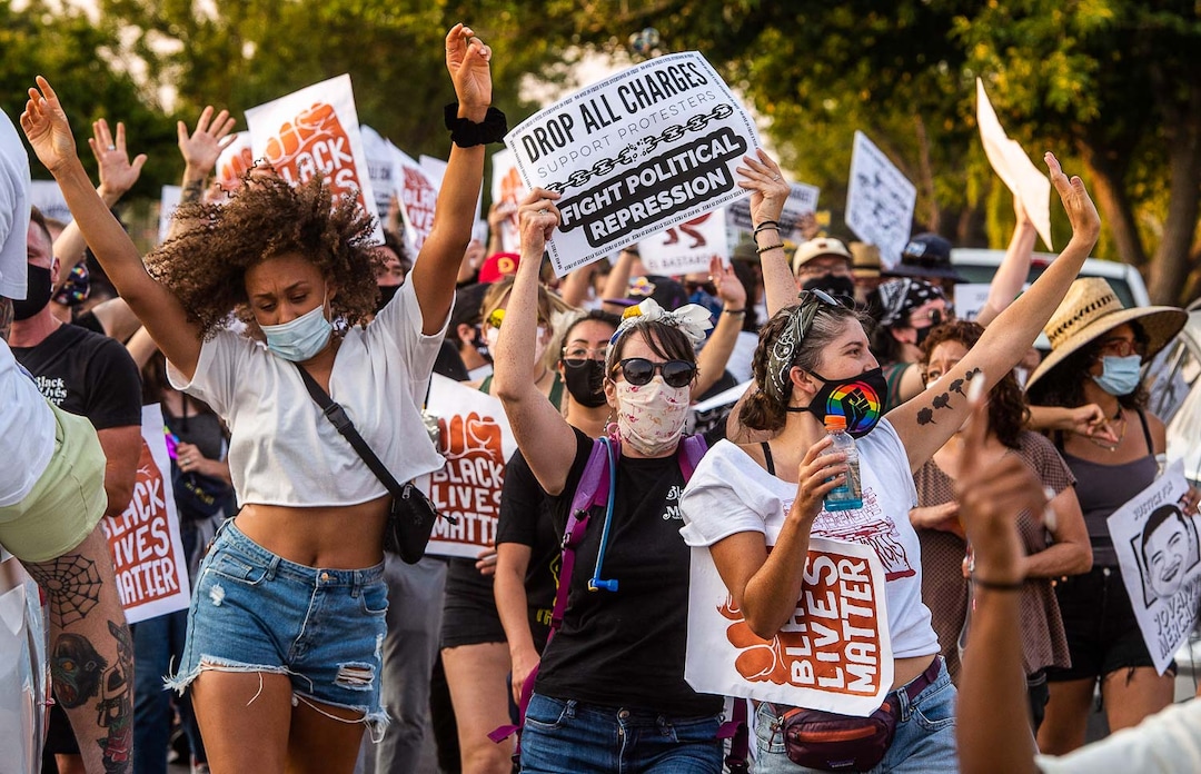 (Rick Egan  |  The Salt Lake Tribune)  Protesters dance in downtown Salt Lake City, during the Dance Dance Revolution protest for racial equality, on Sunday, Aug. 23, 2020.