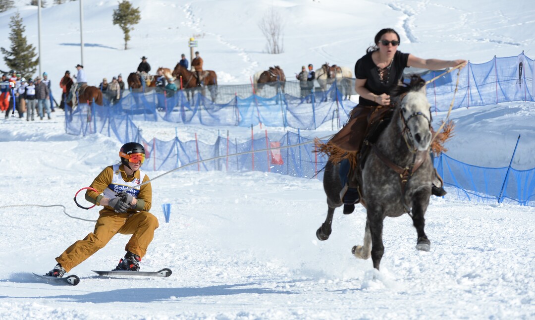 (Rick Egan  |  The Salt Lake Tribune)    Ashley pulls Dylan the skier, for team "Riding in Style", in the Skijoring competition at Soldier Hollow Friday.  Feb. 22, 2019.   
