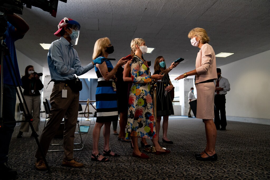 (Anna Moneymaker | The New York Times)
Sen. Lisa Murkowski (R-Alaska), right, speaks to reporters before a luncheon with other Senate Republicans in Washington, on Thursday, July 23, 2020. "The role of the press in a functioning democracy is as watchdog, not partisan attack dog. Politicians have plenty of people spinning for them. They don’t need the press doing that, too," writes New York Times opinion columnist Maureen Dowd.