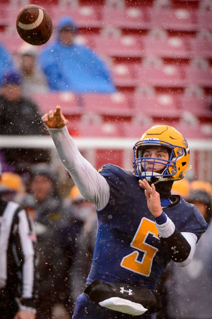 (Trent Nelson | The Salt Lake Tribune)  Orem's Cooper Legas (5) passes as Orem faces Mountain Crest in the Class 4A High School State Football Championship game in Salt Lake City, Friday November 17, 2017.