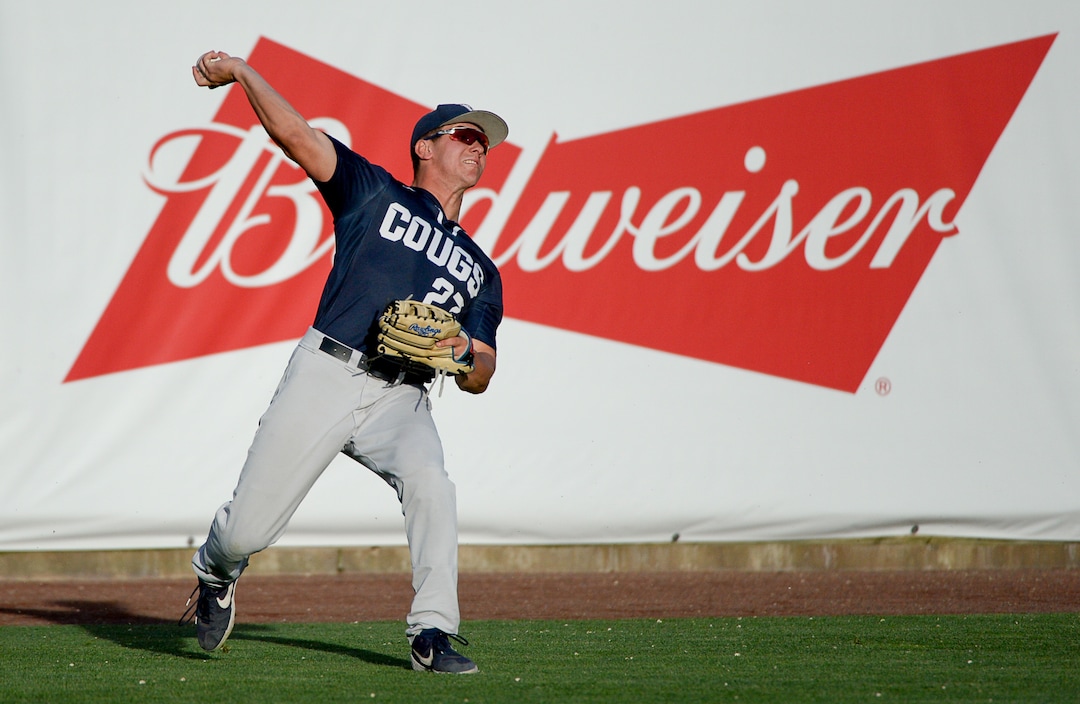 (Francisco Kjolseth  |  The Salt Lake Tribune)  Ryan Sepede moves to get the ball back from the outfield as Utah and BYU renew their rivalry on the baseball diamond as they battle it out at Smith's Ballpark in Salt Lake City on Tuesday, May 14, 2019.