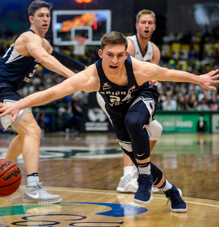 (Steve Griffin  |  The Salt Lake Tribune) Brigham Young Cougars guard McKay Cannon (24) knocks a pass away during the BYU versus UVU basketball game at UCCU Center on the UVU campus in Orem Wednesday November 29, 2017.