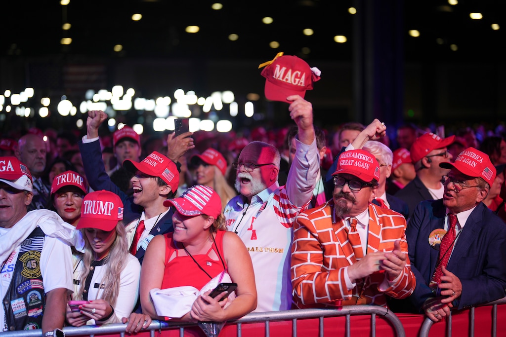 (Doug Mills | The New York Times) Attendees react during an election night event for Former President Donald Trump, the Republican presidential nominee, at the Palm Beach County Convention Center in West Palm Beach, Fla., on Tuesday, Nov. 5, 2024.