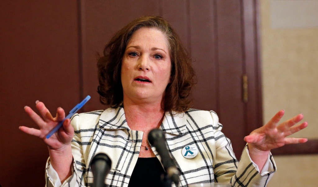 (AP Photo/Rick Bowmer, File) In this April 5, 2018, file photo, plaintiff McKenna Denson speaks with reporters during a news conference in Salt Lake City.