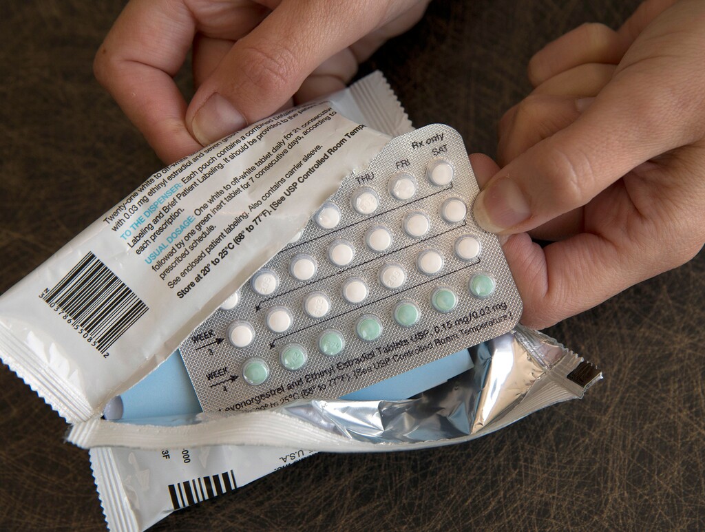 FILE - In this Aug. 26, 2016, file photo, a one-month dosage of hormonal birth control pills is displayed in Sacramento, Calif.  The Trump administration’s new birth control rule is raising questions among some doctors and researchers. They say it overlooks known benefits of contraception while selectively citing data that raise doubts about effectiveness and safety. Recently issued rules allow more employers to opt out of covering birth control as a preventive benefit for women under former President Barack Obama’s health care law.(AP Photo/Rich Pedroncelli, File)