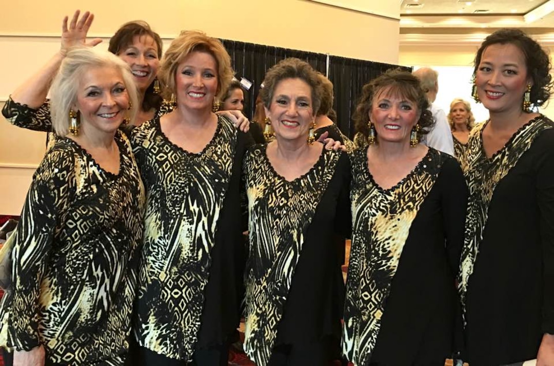 (Photo courtesy of Kathie Allen) Kathie Allen (left) poses for a picture with members of her Sweet Adelines chorus.