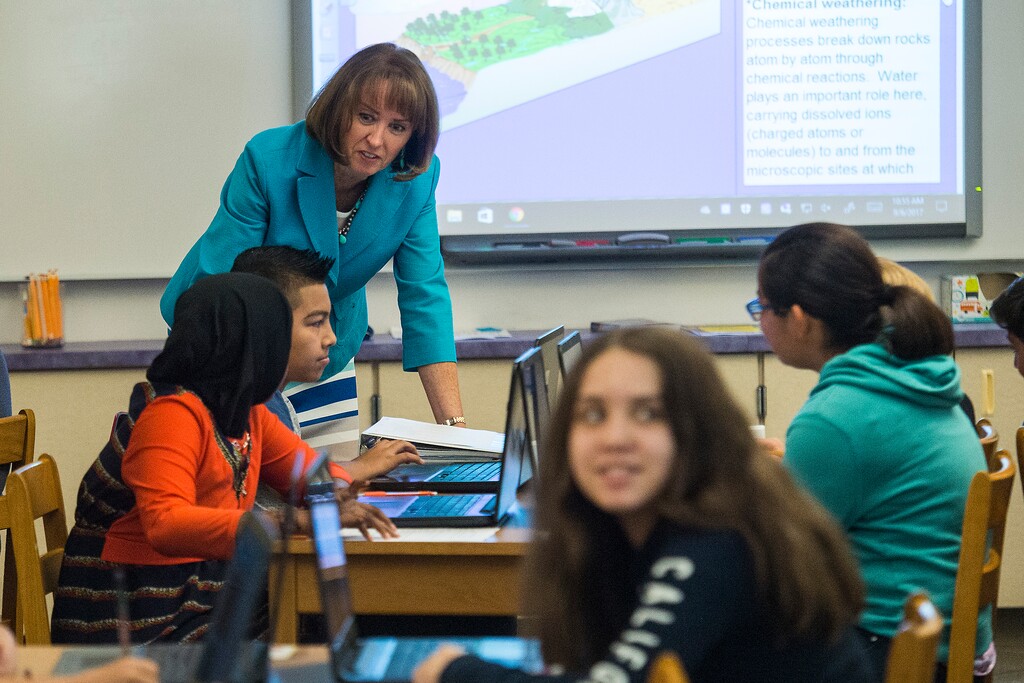 (Chris Detrick  |  The Salt Lake Tribune)  Utah State Superintendent Sydnee Dickson works with a seventh grade science class at Nibley Park School Wednesday, September 6, 2017. 
