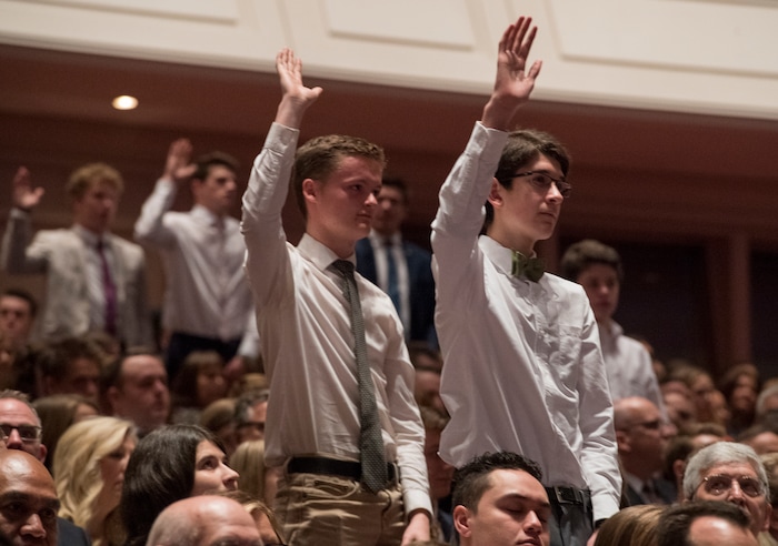 (Rick Egan  |  The Salt Lake Tribune)         LDS Aaronic priesthood members, stand to sustain President Russell M. Nelson and the first presidency of the church, during a  Solemn Assembly in the Saturday morning session of the 188th Annual General Conference in Salt Lake City,  Saturday, March 31, 2018.