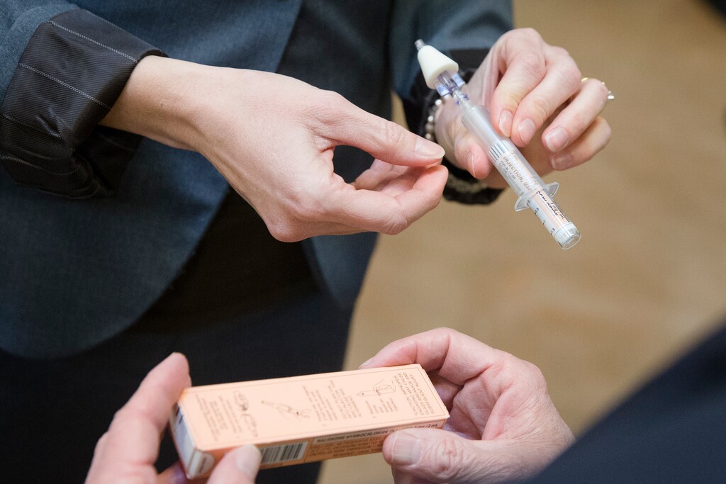 (AP Photo/John Minchillo) A Naloxone nasal injector being demonstrated at a Cincinnati supermarket in 2016. Officials with the Utah Department of Health announced Thursday that a six-month pilot program to promote use of the anti-overdose drug by health and law enforcement agencies had resulted in distribution of nearly 2,000 Naloxone kits — and at least 46 cases where opioid overdoses were reversed.