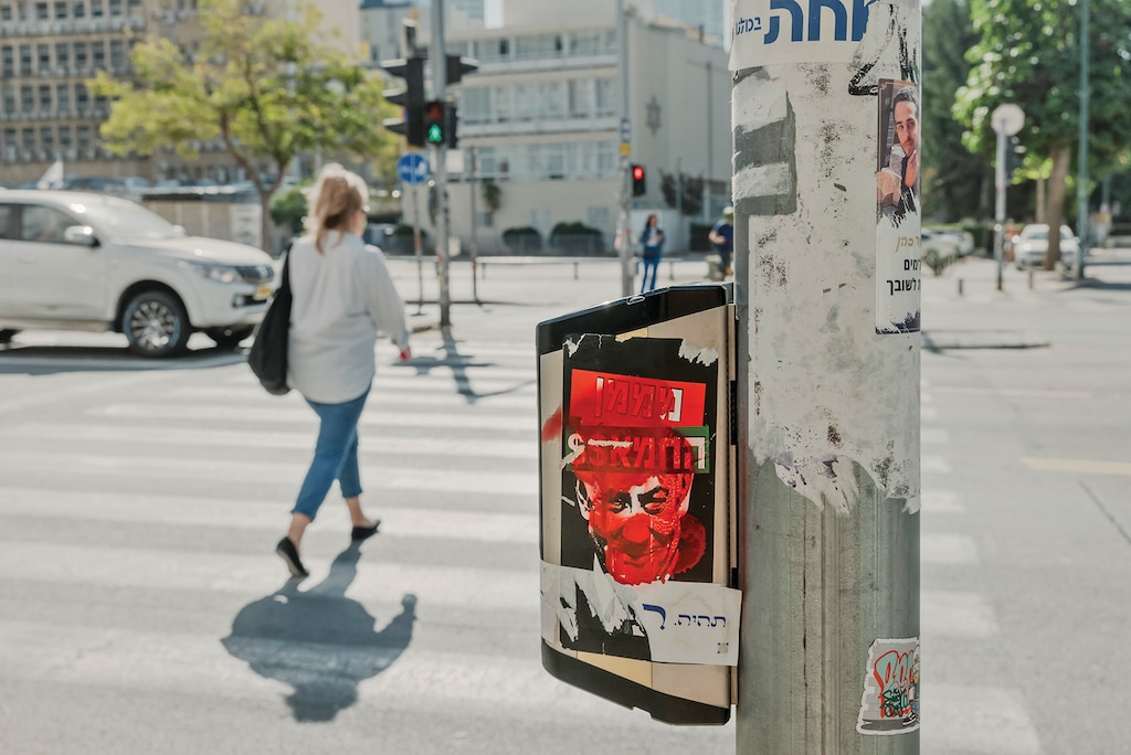 A poster of Prime Minister Benjamin Netanyahu of Israel and the words “Hamas’ Funder” in Tel Aviv, Israel, Oct. 30, 2025. (Ofir Berman/The New York Times)