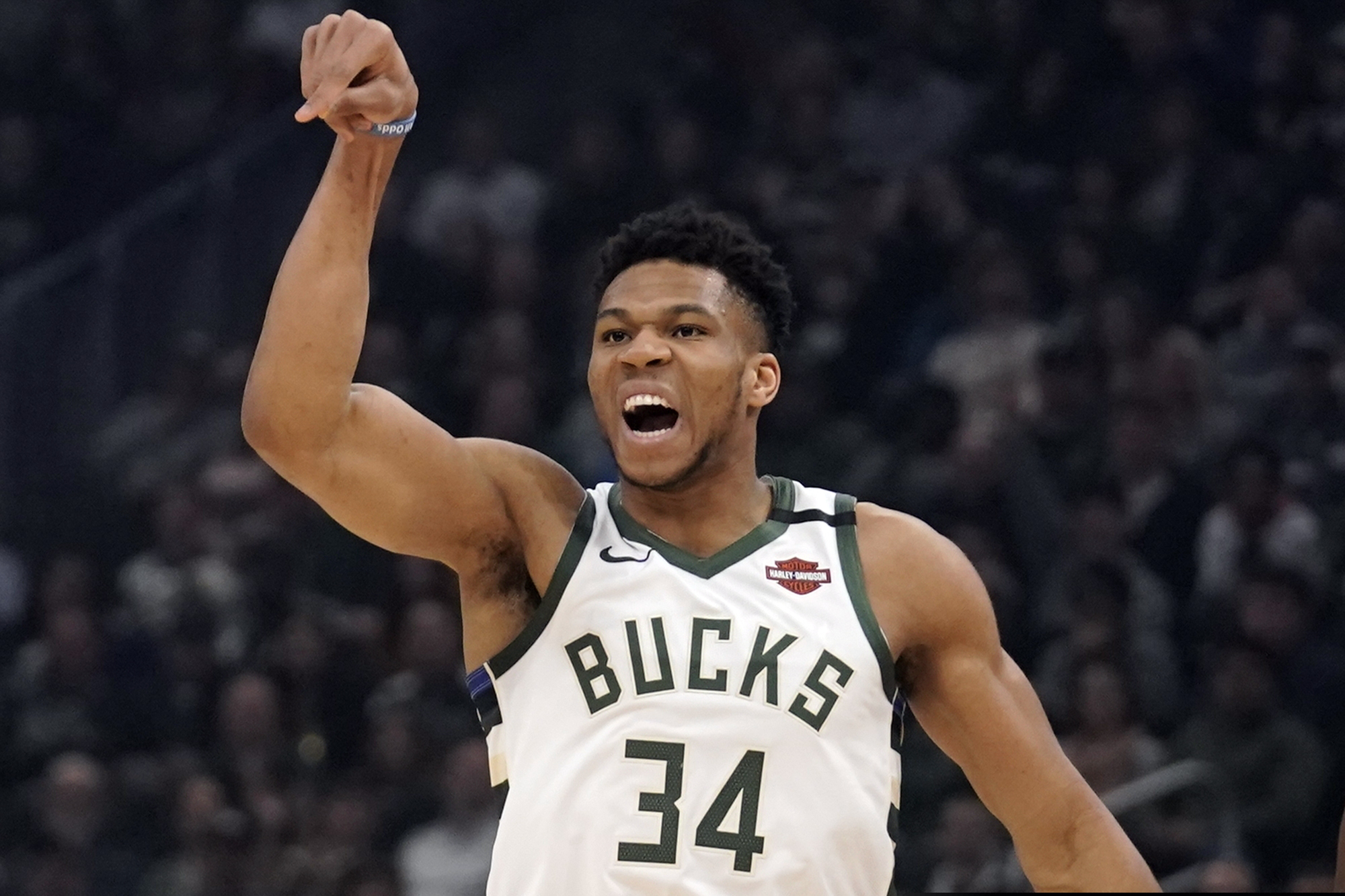 FILE - Milwaukee Bucks' Giannis Antetokounmpo reacts to his shot the first half of an NBA basketball game against the Philadelphia 76ers in Milwaukee. (AP Photo/Morry Gash, File)