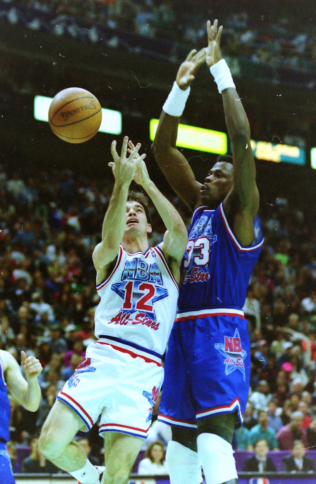(Steve Griffin | Tribune file photo) John Stockton (12) drives with the ball as Patrick Ewing (33) defends during the 1993 All-Star Game at the Delta Center in Salt Lake City, Sunday, Feb. 21, 1993.