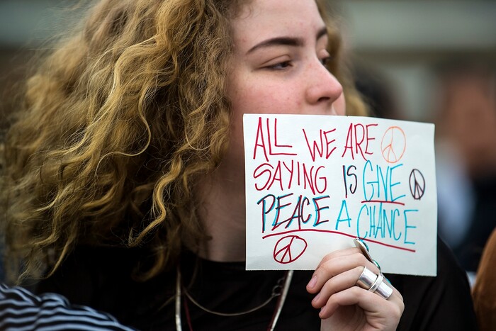 (Chris Detrick  |  The Salt Lake Tribune)  Senior Zina Runyan participates in a nationwide demonstration for better gun safety laws at Highland High School in Salt Lake City Thursday, March 15, 2018. Students at more than 30 schools along the Wasatch Front, nearly all of them high schools, particiapted in the 17-minute walkout Ñ one minute for each of the Florida students killed.