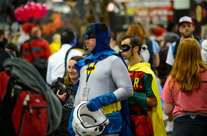 (Steve Griffin  |  The Salt Lake Tribune)  Batman and Robin make their way through the crowds at the Salt Lake Comic Con in Salt Lake City Friday September 22, 2017.