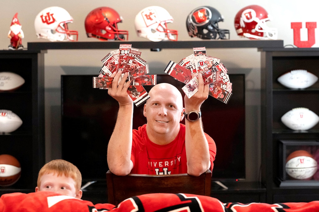 (Francisco Kjolseth | The Salt Lake Tribune) University of Utah is doing away with paper tickets for all its sporting events, and season-ticket holders and those who collect their ticket stubs, like Jeff Dart, joined by his son Eric, 5, is bemoaning the end of an era and even offering to pay more for hard tickets.