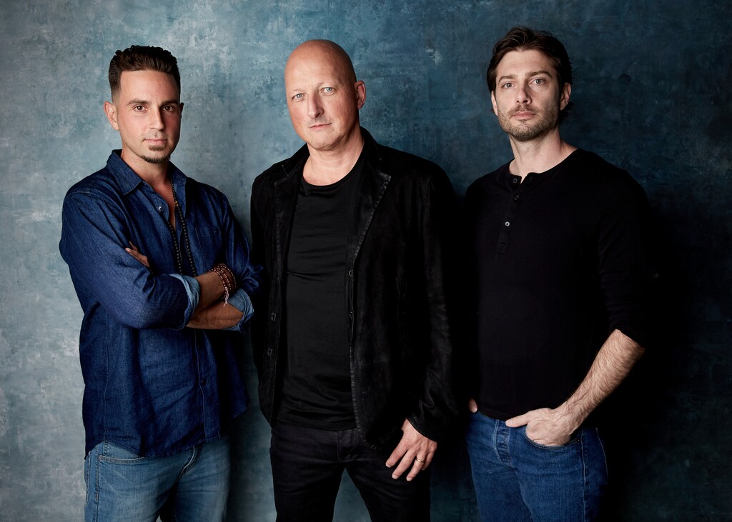 (Photo by Taylor Jewell/Invision/AP) Wade Robson, from left, director Dan Reed and James Safechuck pose for a portrait to promote the film "Leaving Neverland" at the Salesforce Music Lodge during the Sundance Film Festival on Thursday, Jan. 24, 2019, in Park City, Utah.
