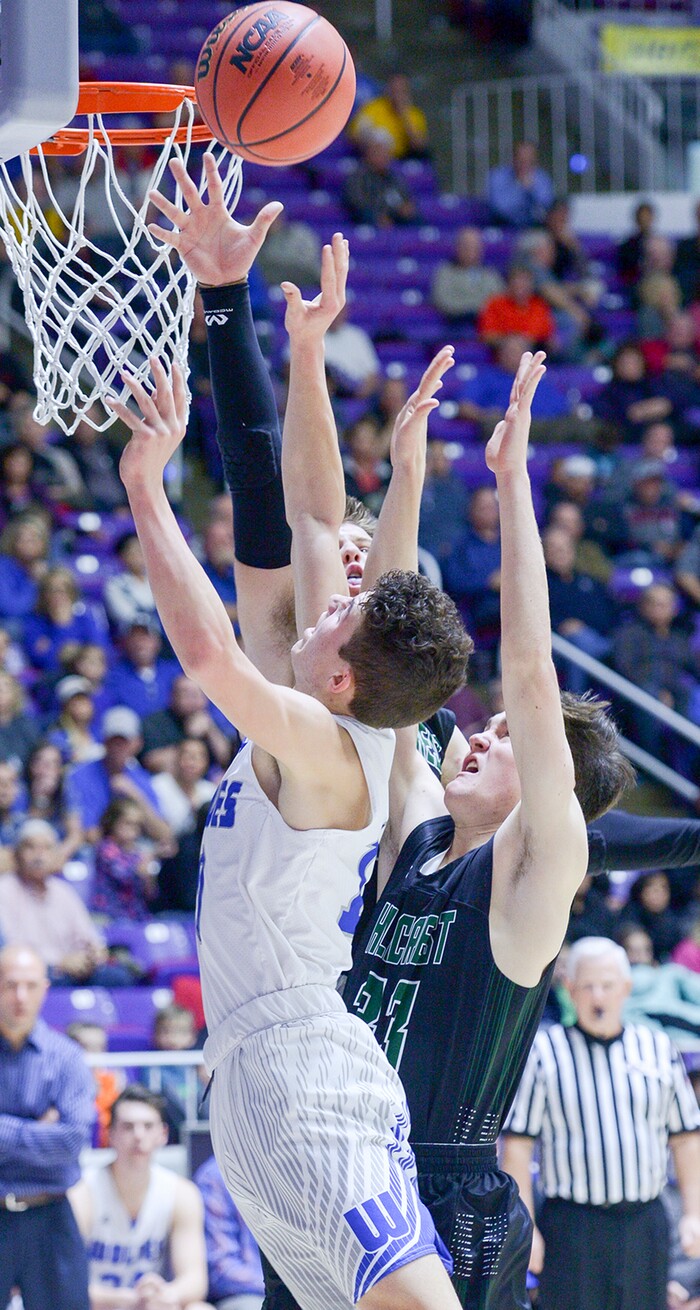 (Leah Hogsten  |  The Salt Lake Tribune) Hillcrest's Mckay Ashby (32) blocks Fremont's Baylor Harrop (10) shot. Fremont defeated Hillcrest 62-52 in the 6A High School Boys' Basketball Tournament opening game at Weber State University’s Dee Events Center in Ogden, Tuesday, Feb. 27, 2018. 