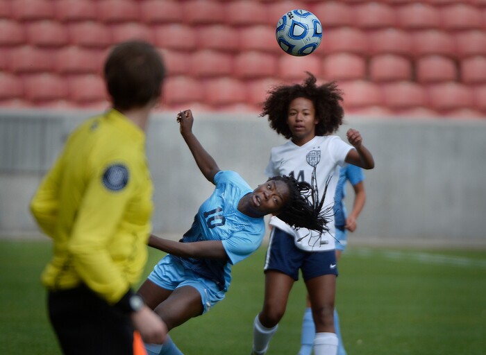 (Scott Sommerdorf | The Salt Lake Tribune)
Sky View's Emmie Woodward gets twisted around trying to make a header during second half play. Sky View defeated Bonneville 2-0 to win the 4A title game, Saturday, October 21, 2017.