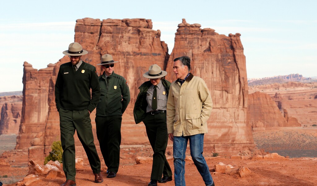 In this Saturday, March 3, 2018 photo, Mitt Romney tours of Arches National Park, near Moab, Utah. The former Republican presidential nominee continues his bid to become a U.S. Senator for Utah. (AP Photo/Rick Bowmer)