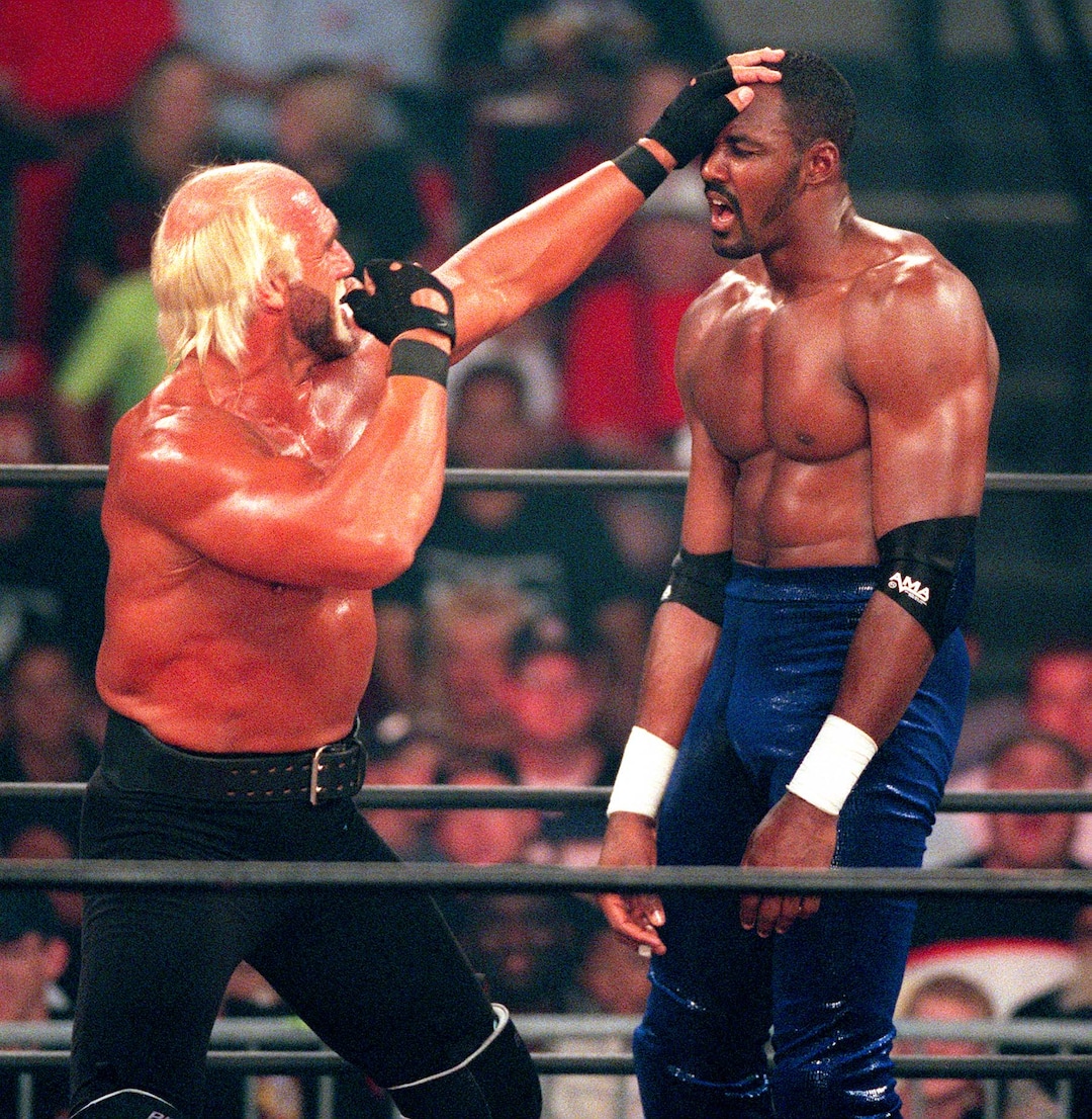 (Trent Nelson | The Salt Lake Tribune)  Karl Malone wrestles Hollywood Hulk Hogan at WCW's Bash at the Beach in San Diego. July 12, 1998.