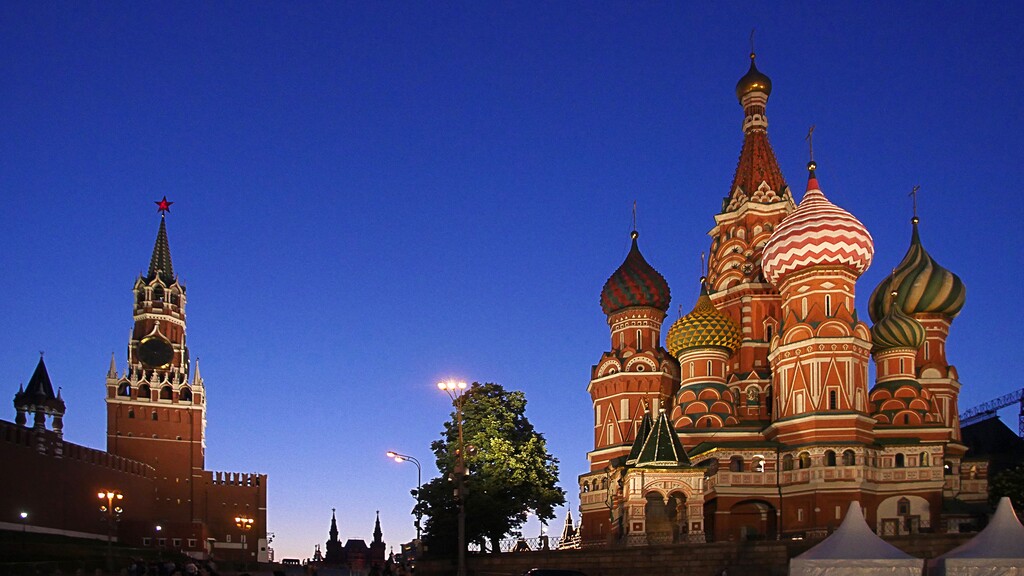 (Michael Stack  |  Special to The Salt Lake Tribune) Red Square at dusk, the Kremlin, seat of the government, left, and St. Basil’s Cathedral on the right.
