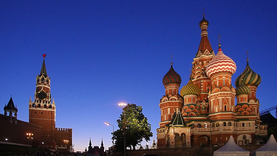 (Michael Stack  |  Special to The Salt Lake Tribune) Red Square at dusk, the Kremlin, seat of the government, left, and St. Basil’s Cathedral on the right.