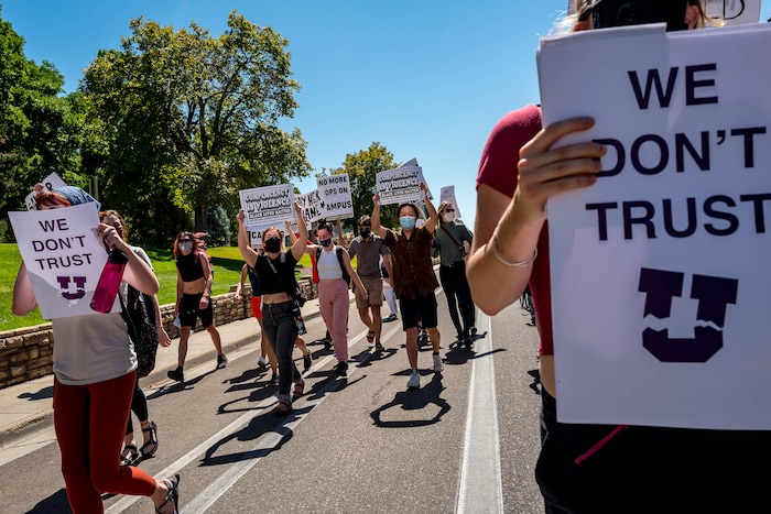 (Trent Nelson | The Salt Lake Tribune) Protesters march at the University of Utah in Salt Lake City on Thursday, Sept. 3, 2020. The protest called for President Ruth Watkins to resign and for the campus police department to be dissolved..