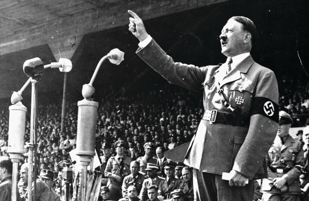 German Chancellor Adolf Hitler gestures during a speech in May 1937 at an unknown location in Germany. He became the dictator of Germany in 1933, and launched the Holocaust as a "final solution" to the "Jewish problem" as well as gypsies and homosexuals. (AP Photo)