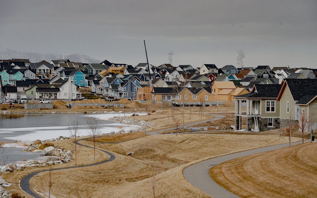 (Francisco Kjolseth  |  The Salt Lake Tribune) Ongoing development takes shape around Oquirrh Lake at Daybreak on Thursday, Jan. 9, 2020. Daybreak, the 4,100-acre master planned community in South Jordan, illustrates the idea of blending higher density housing and walkable community design with ample amounts of open space. That "smart growth" land use approach is being required by Salt Lake County for a proposed development called Olympia Hills, a 933-acre residential and commercial project proposed west of Herriman.