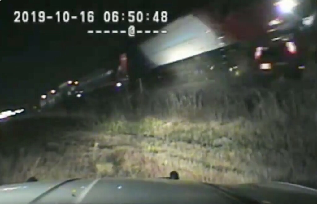 (Screenshot courtesy of Utah Highway Patrol/Twitter) A screenshot from a Utah Highway Patrol dash camera shows Trooper Ruben Correa rescuing a motorist who was stranded on FrontRunner tracks.