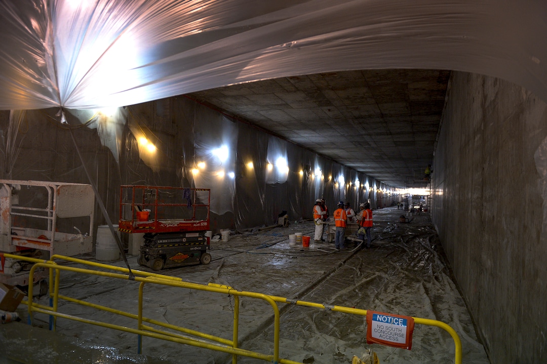Leah Hogsten  |  The Salt Lake Tribune Tradesmen work on the new Salt Lake City International Airport expansion project tunnel that will connect the North and South concourses, Monday, Oct. 22, 2018. The first phase construction of the $3.6 billion project is due to open in 700 days. Nearing completion is the new concourse for aircraft gates, an enclosed terminal, the steel skeleton of a new "gateway" building, a five-story parking garage and elevated roadways. 