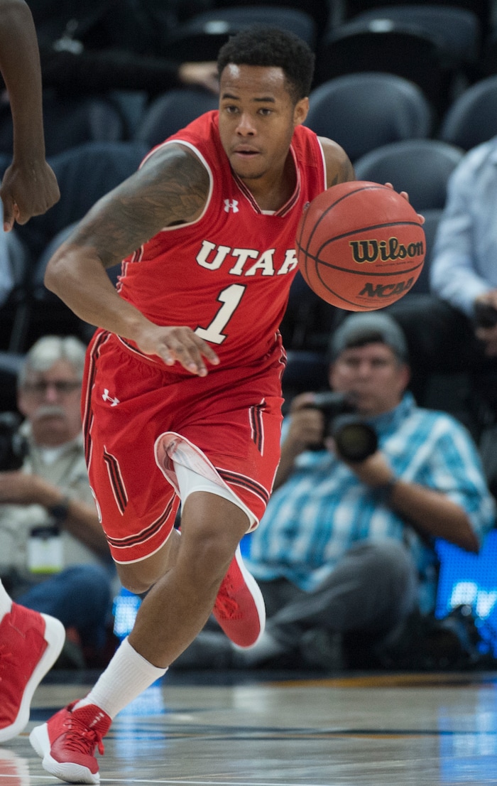 (Rick Egan  |  The Salt Lake Tribune)  Utah guard Justin Bibbins (1) leads a fast break for the Utes, in Beehive Classic basketball action at the Vivint SmartHome Arena, Saturday, December 9, 2017.