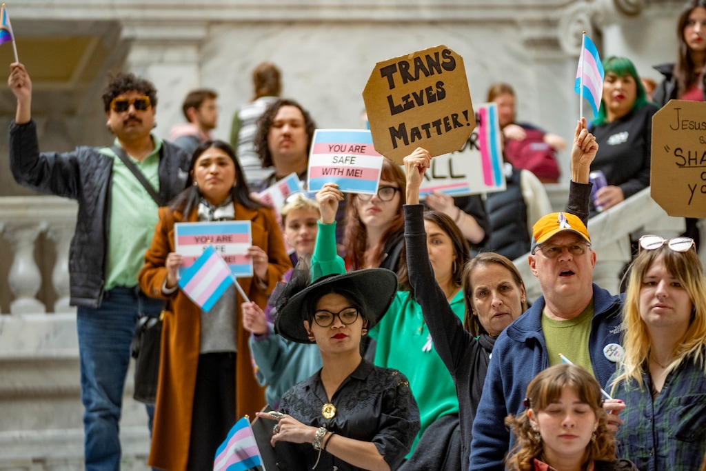 (Rick Egan | The Salt Lake Tribune) Transgender rights protesters walk around in the Capitol rotunda on Wednesday, Jan. 21, 2026.