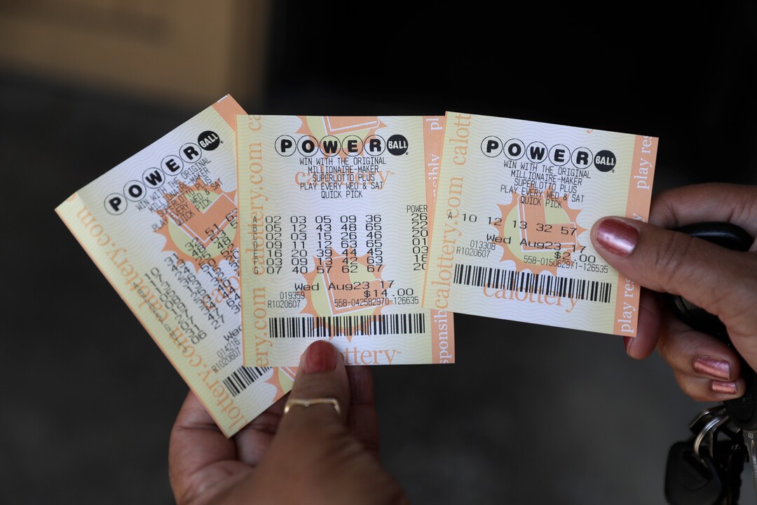 Powerball tickets are shown outside of a a liquor store Wednesday, Aug. 23, 2017, in Fremont, Calif. Officials estimated jackpot for Wednesday night's Powerball lottery game has climbed to $700 million, making it the second largest in U.S. history. (AP Photo/Marcio Jose Sanchez)
