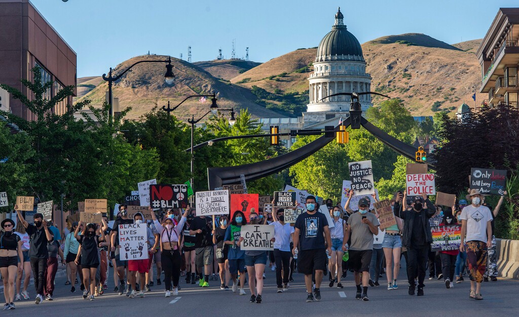 (Rick Egan  |  Tribune file photo)     Protesters march down State Street, during a demonstration in Salt Lake City, on Wednesday, June 10, 2020.