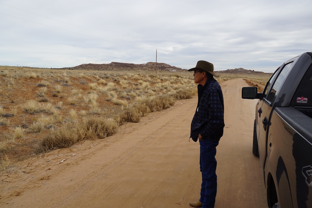 (Zak Podmore | The Salt Lake Tribune) San Juan County Commissioner Kenneth Maryboy examines a road on the Navajo Nation that is being maintained by the Navajo Department of Transportation. The county hopes to sign an agreement with the tribal government in order to assist with road maintenance.