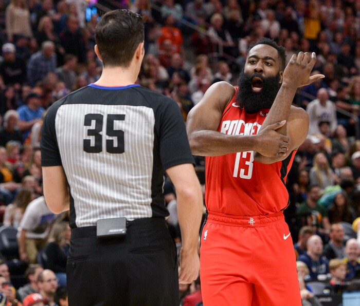 (Leah Hogsten  |  The Salt Lake Tribune)  Houston Rockets guard James Harden (13) discusses his foul with referee Jason Goldenberg. The Utah Jazz host the Houston Rockets at Vivint Arena, Feb. 22, 2020.