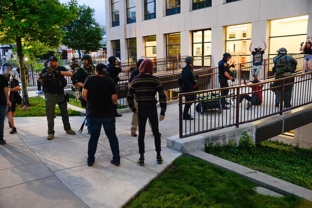 (Francisco Kjolseth  |  The Salt Lake Tribune) Police arrest Jarod Hartlerode, far right, after yelling "drop the pipe," multiple times. It is unclear what type of pipe they were referring to. While lying on his stomach an officer shot him in the back with a bean bag as hundreds of protesters took to the streets of Salt Lake City engaging with the police on Saturday, May 30, 2020. The protest was in response to the death of George Floyd in Minneapolis.