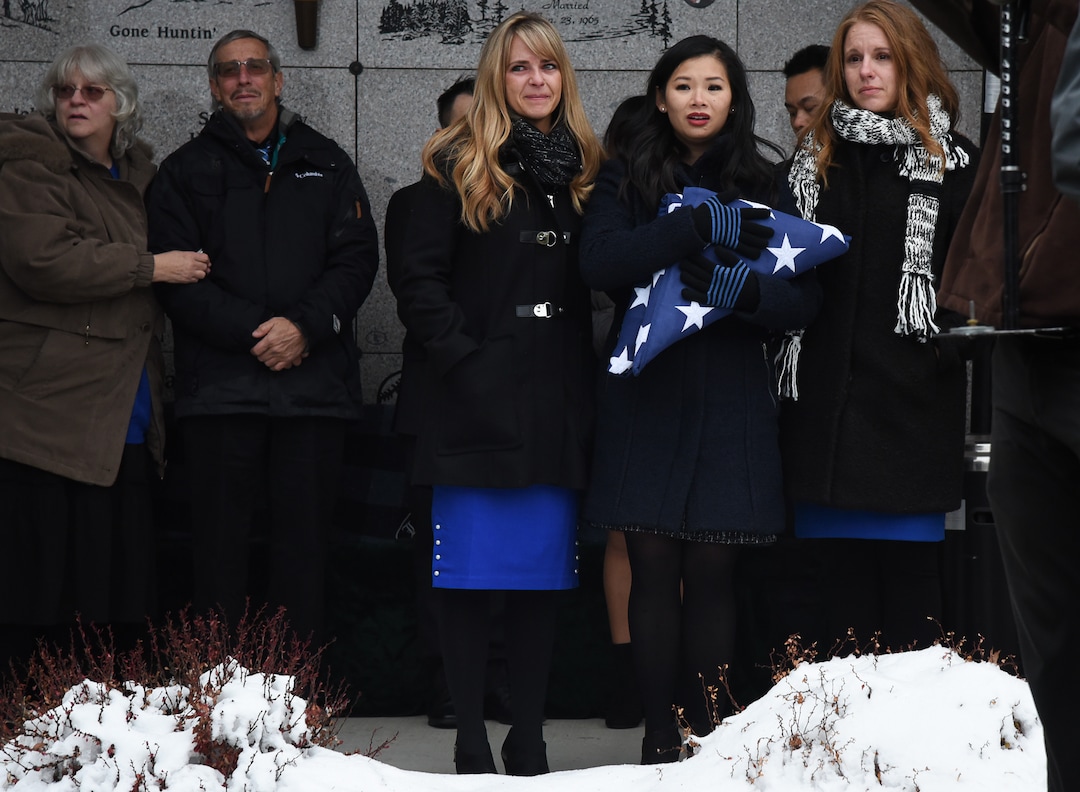 (Francisco Kjolseth  |  The Salt Lake Tribune)  Police officer David Romrell's funeral services take place at Larkin Sunset Gardens Cemetery in Sandy, Wed. Dec. 5, 2018.