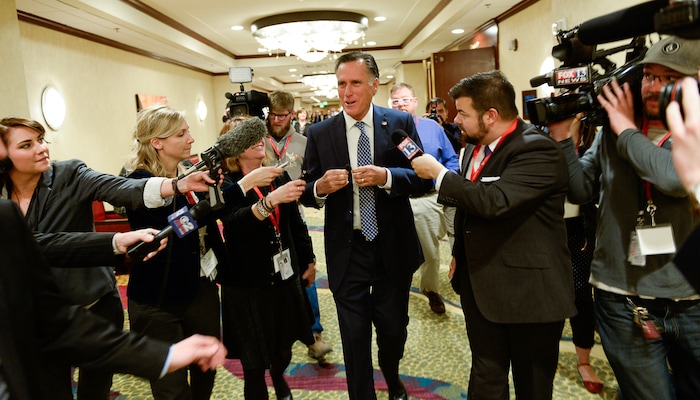 (Francisco Kjolseth  |  The Salt Lake Tribune)  Mitt Romney is pursued by the media hoping to get an answer to a possible run for senate after he spoke at the Utah Economic Outlook & Policy Summit 2018, hosted by the Salt Lake Chamber at the Salt Lake City Marriott Downtown at City Creek on Tuesday, Jan. 16, 2018. 