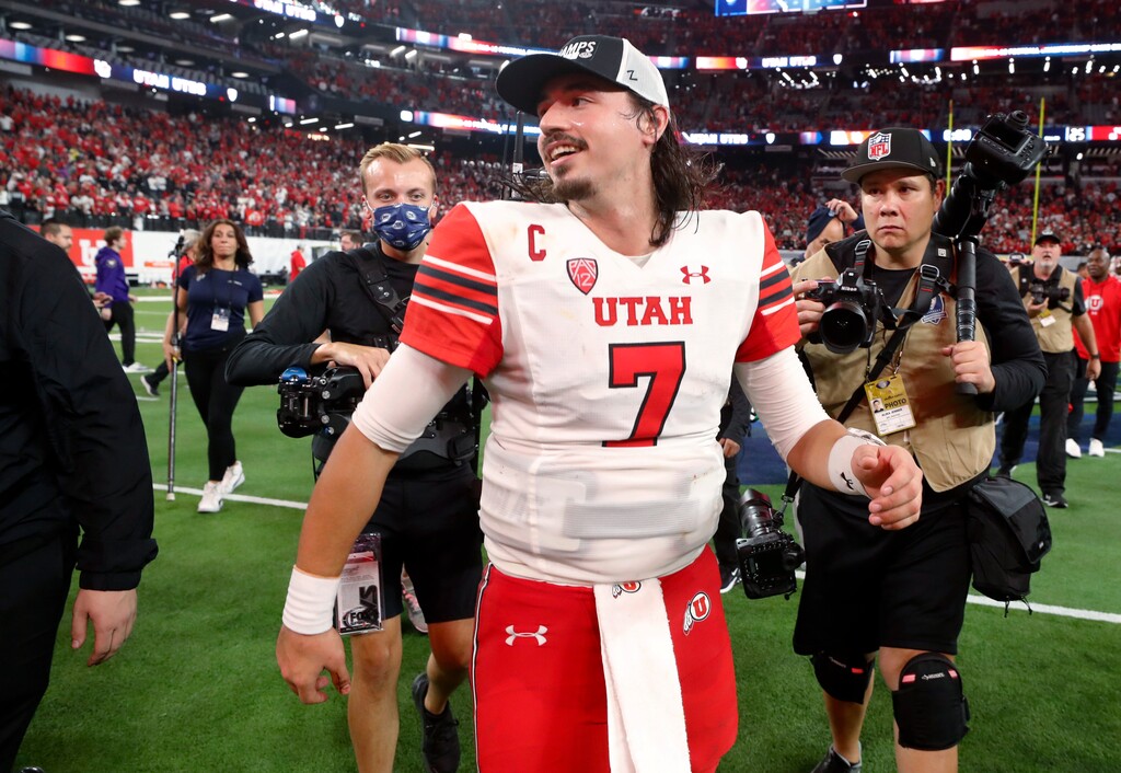 (Steve Marcus | AP) Utah quarterback Cameron Rising (7) walks across the field after Utah's 47-24 victory over Southern California in the Pac-12 Conference championship NCAA college football game Friday, Dec. 2, 2022, in Las Vegas.