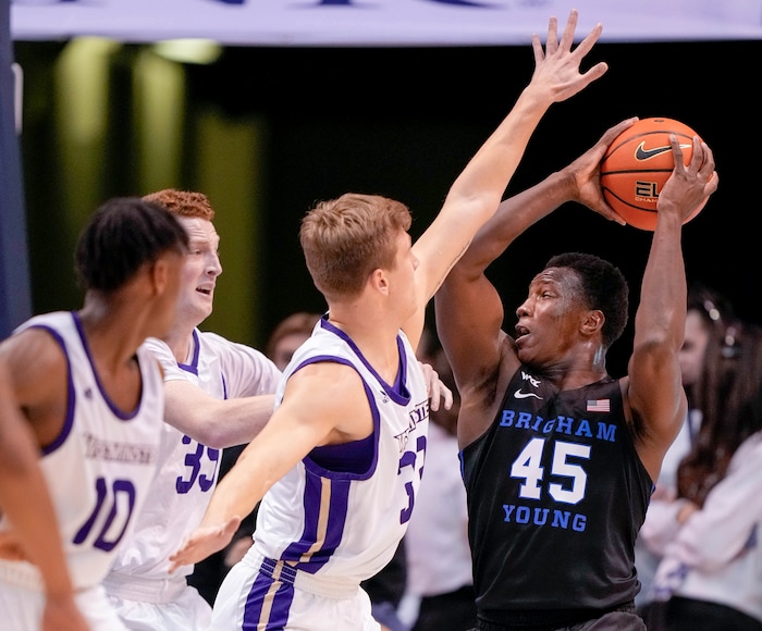 (Francisco Kjolseth | The Salt Lake Tribune) Brigham Young Cougars forward Fousseyni Traore (45) faces a defensive wall in basketball action between the Brigham Young Cougars and the Westminster Griffins at the Marriott Center in Provo, Wednesday, Dec. 29, 2021.