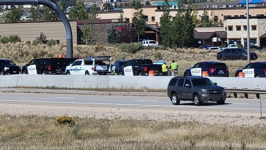(Bob Frank | FOX 13) Police officers are shown on the scene of a crash on U.S. 40 near Park City on Wednesday.