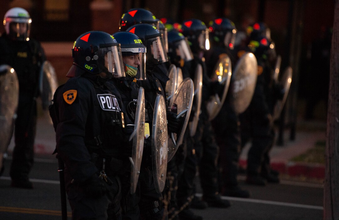 (Francisco Kjolseth  |  The Salt Lake Tribune) Police try to keep supporters and counter protesters of President Donald Trump apart during a rally near Kingsbury Hall on the University of Utah campus in Salt Lake City on Wednesday, Oct. 7, 2020, during the vice presidential debate.