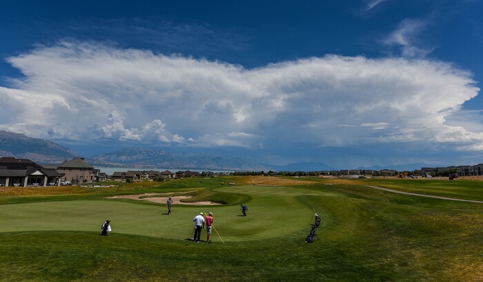 (Francisco Kjolseth  |  The Salt Lake Tribune)  Under a dramatic sky, local pros and nationwide travelers make their annual attempt to qualify for the Utah Championship on the Web.com Tour as they play at Talons Cove Golf Course in Saratoga Springs on Monday, July 7, 2018, for a shot to play in a PGA Tour-brand event. Only 12 players advance from a field of roughly 140.
