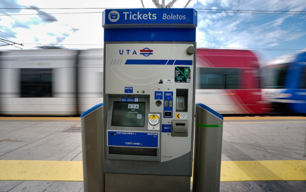 (Francisco Kjolseth | The Salt Lake Tribune) A TRAX train passes at North Temple in Salt Lake City on Wednesday, Aug. 12, 2026. UTA is planning to increase fares from $2.50 to $3.