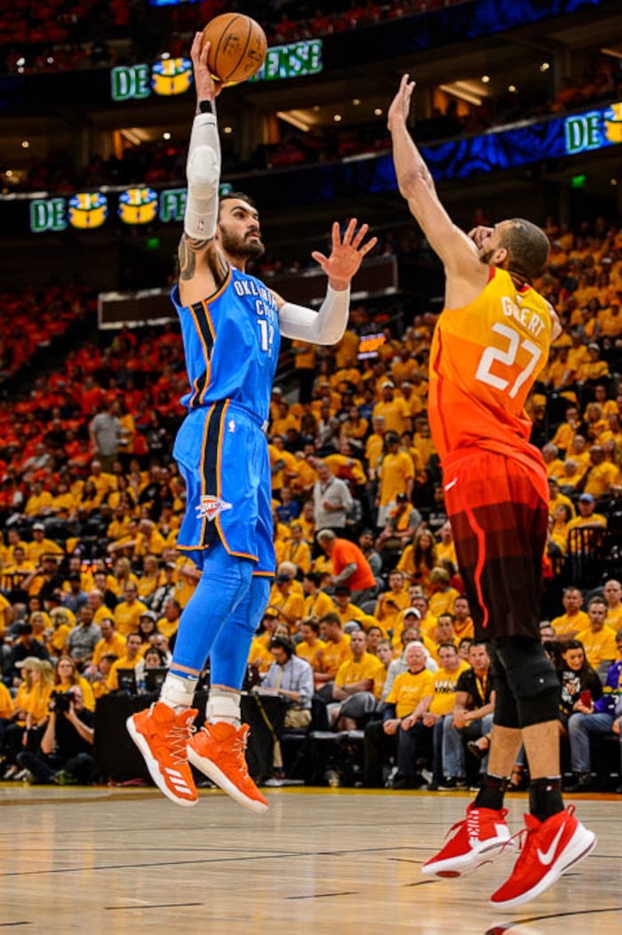 (Trent Nelson | The Salt Lake Tribune)  
Utah Jazz host the Oklahoma City Thunder, Game 3, NBA playoff basketball in Salt Lake City, Saturday April 21, 2018. Oklahoma City Thunder center Steven Adams (12) shoots over Utah Jazz center Rudy Gobert (27).