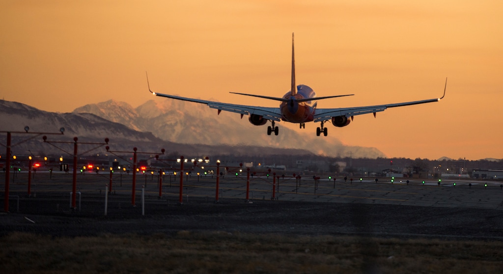 Leah Hogsten  |  The Salt Lake Tribune   A plane lands at Salt Lake City International Airport, Feb. 25, 2019.