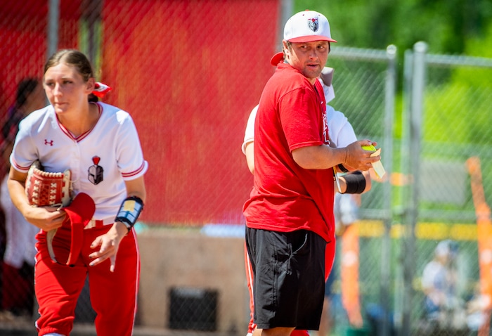 (Isaac Hale | Special to The Tribune) Mountain Ridge head coach Andre Ashton makes a pitching change during the second game of a best-of-three series between the Spanish Fork Lady Dons and the Mountain Ridge Sentinels as part of the 5A state softball championship held at the Spanish Fork Sports Park on Friday, May 28, 2021.